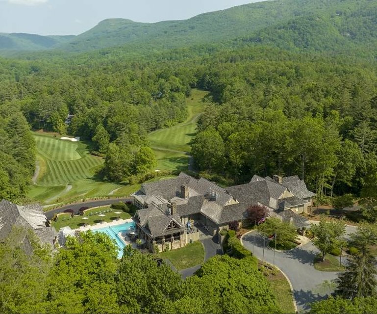 Purposefully built in a mountain forest for family and friends, Burlingame presents a country cl